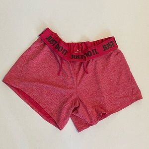 red nike shorts